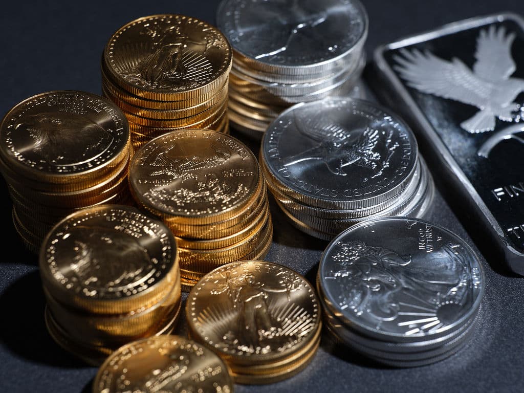 Gold and silver coins and bars